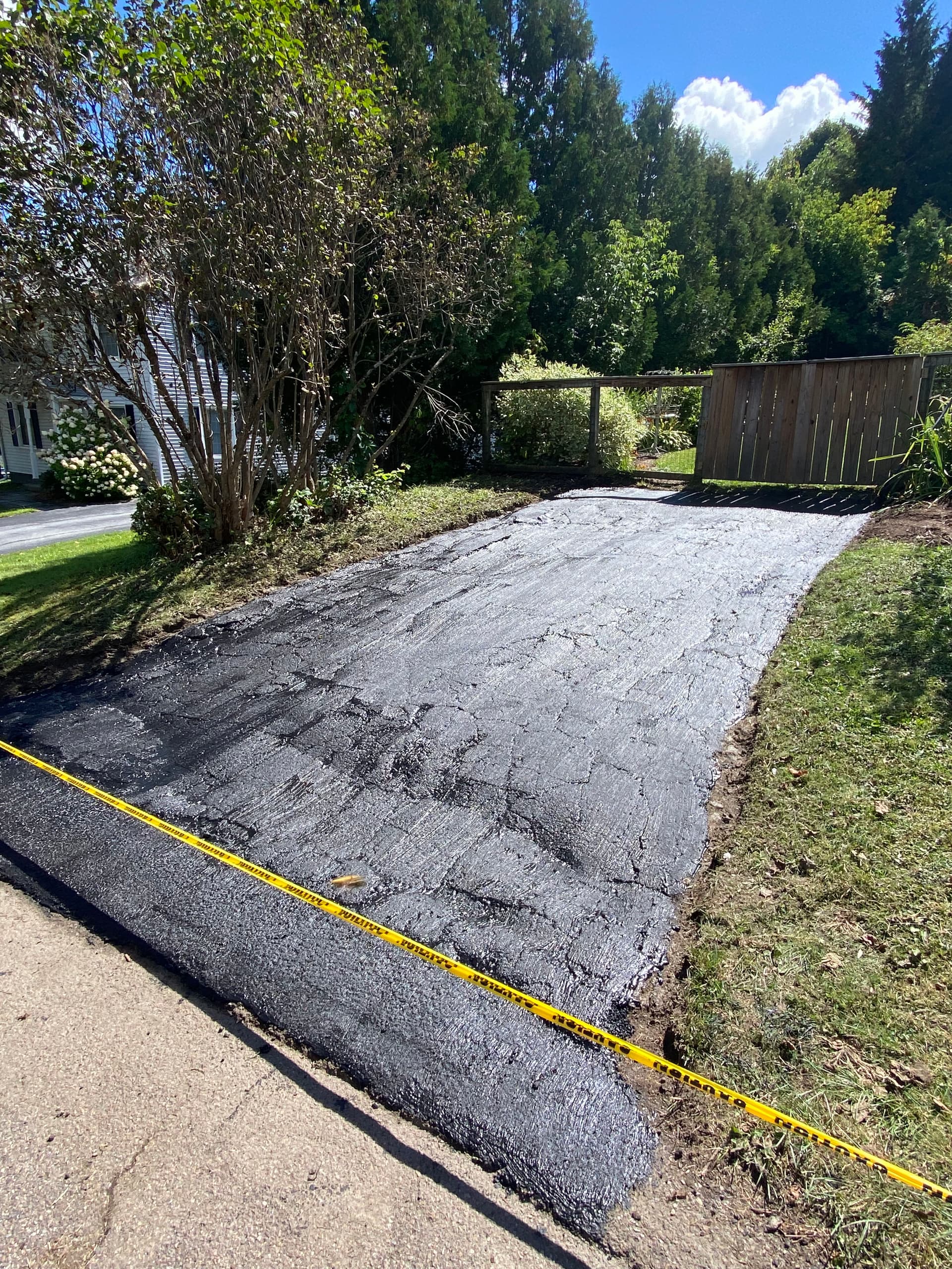Gallery photos for Driveway Sealcoating: Say Goodbye to Cracks and Wear: Image #1